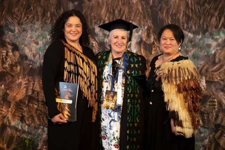 Sue Tipene (Ngai Tahu, Ngai Tūahuriri) and tauira at graduations